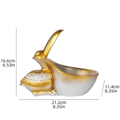Decorative bird-shaped object with measurements on a white background
