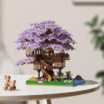 LEGO model of a treehouse with cherry blossoms on a table