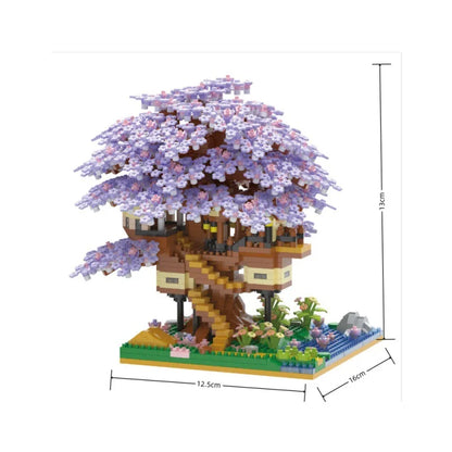 Toy treehouse with cherry blossom branches and measurements on a white background