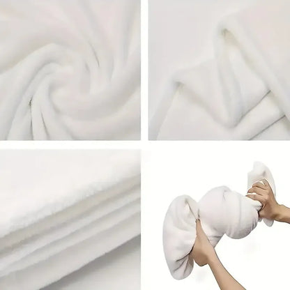 White towel being squeezed by hands with close-up shots of the fabric texture.