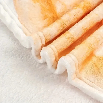 Close-up of a textured orange fabric on a white background