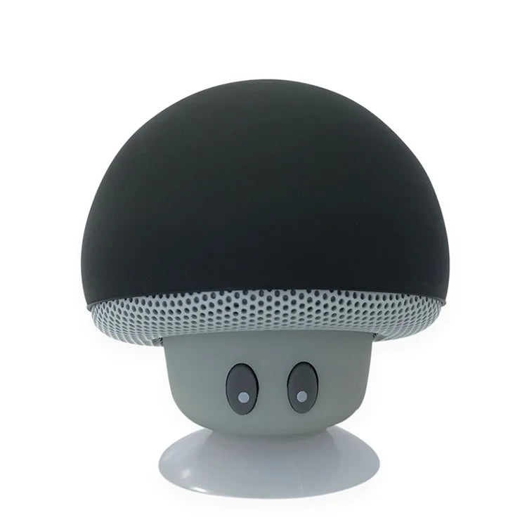 Mushroom-shaped speaker with a black top and gray body on a white background