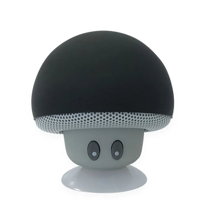 Mushroom-shaped speaker with a black top and gray body on a white background