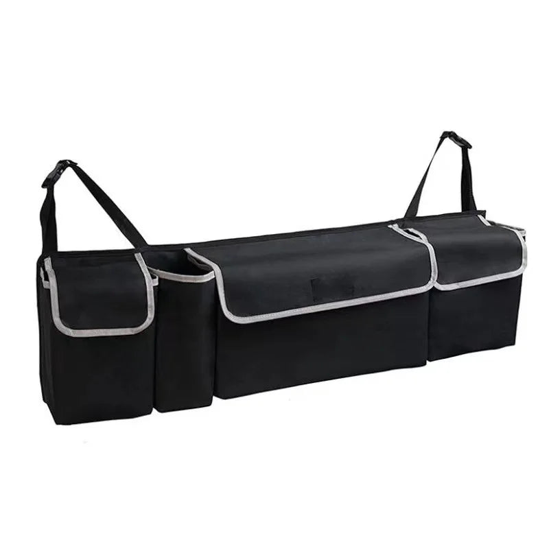 Black car trunk organizer with multiple pockets on a white background