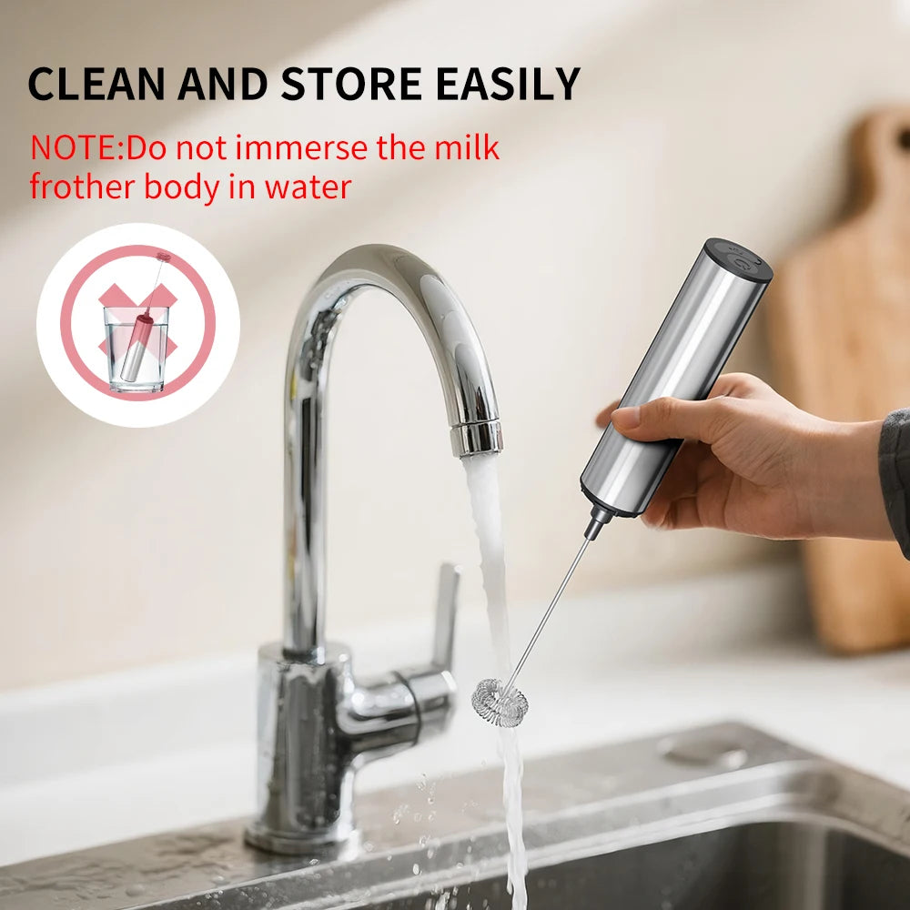 Hand using a milk frother under running water from a faucet with text about cleaning and storage.