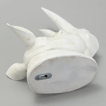 Rhino head wall sculpture displayed in a luxury hotel lobby as an eye-catching animal wall art centerpiece