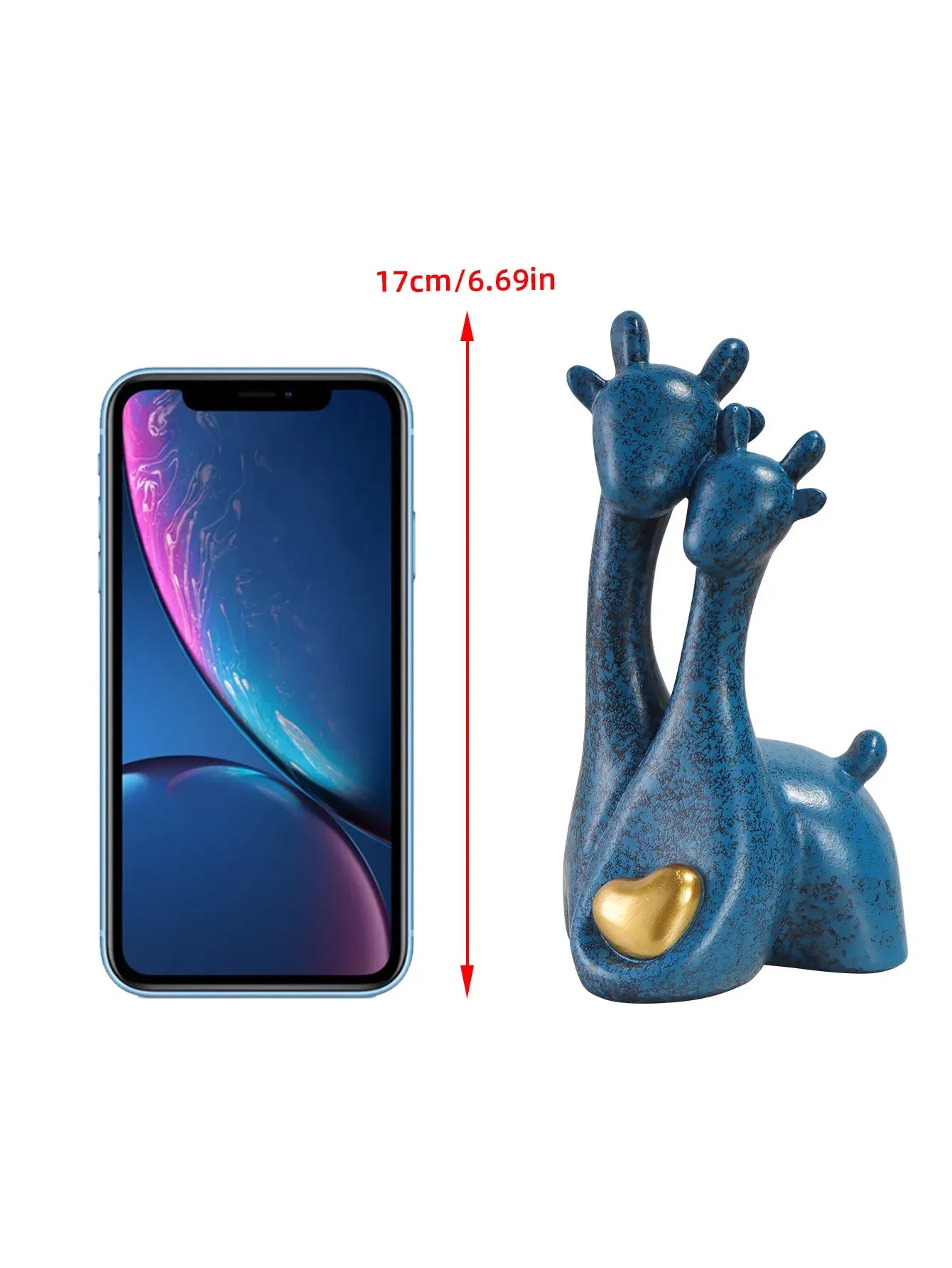 Blue ceramic sculpture of two animals with a heart and an iPhone XR for scale on a white background