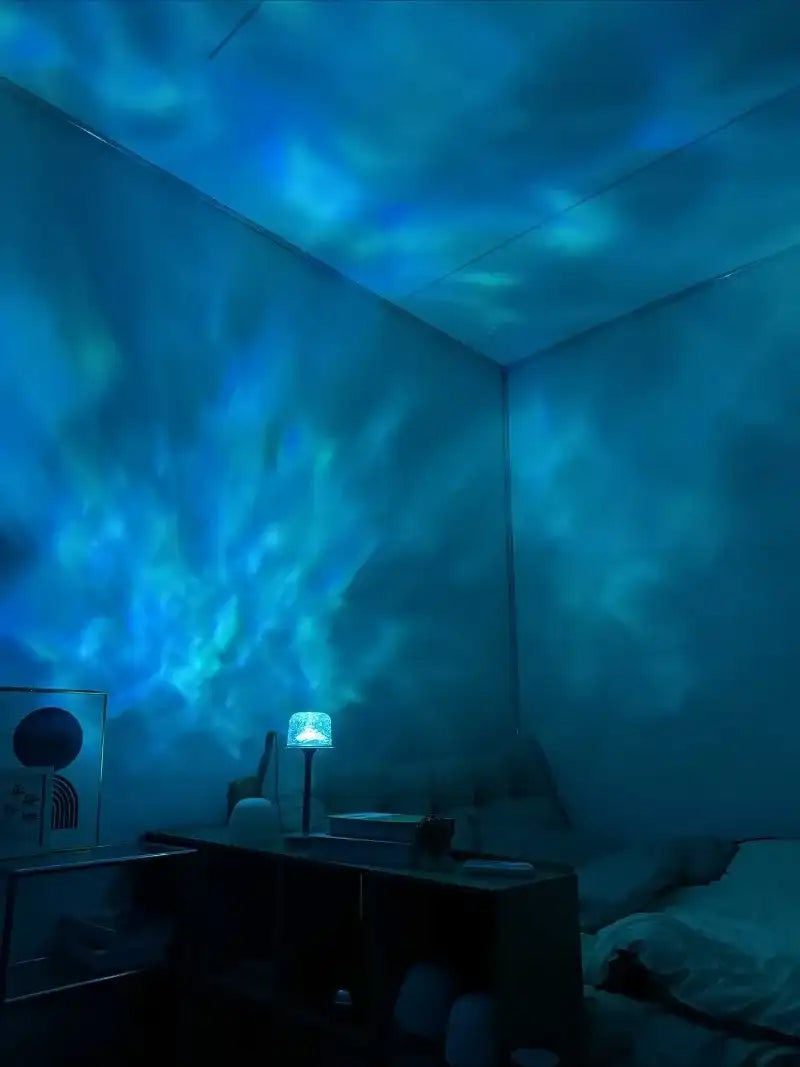 A room with blue light projection on the ceiling and walls, creating an underwater effect.