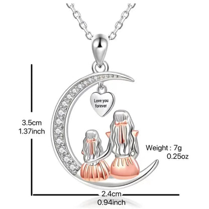 Silver and rose gold necklace with pendant on a white background