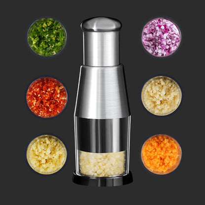 Silver garlic press with minced garlic and various colored minced ingredients on a dark background