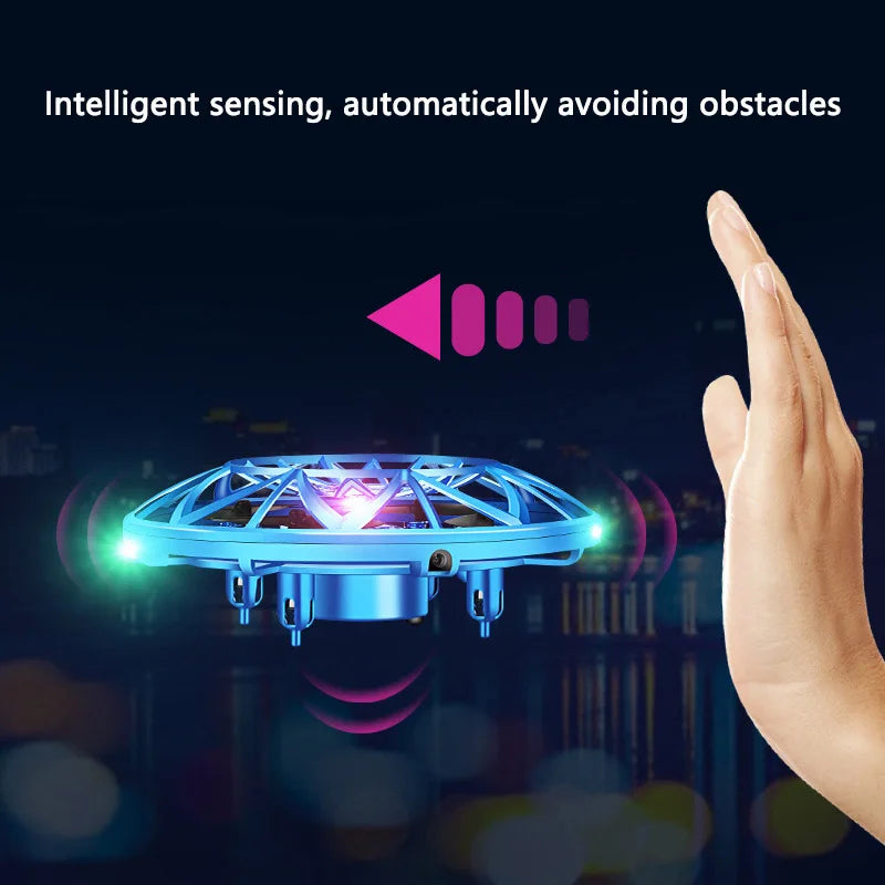 Small drone with glowing lights and a hand reaching towards it, set against a dark background.