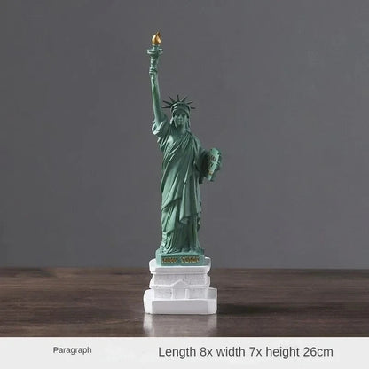 Statue of Liberty figurine on a dark background