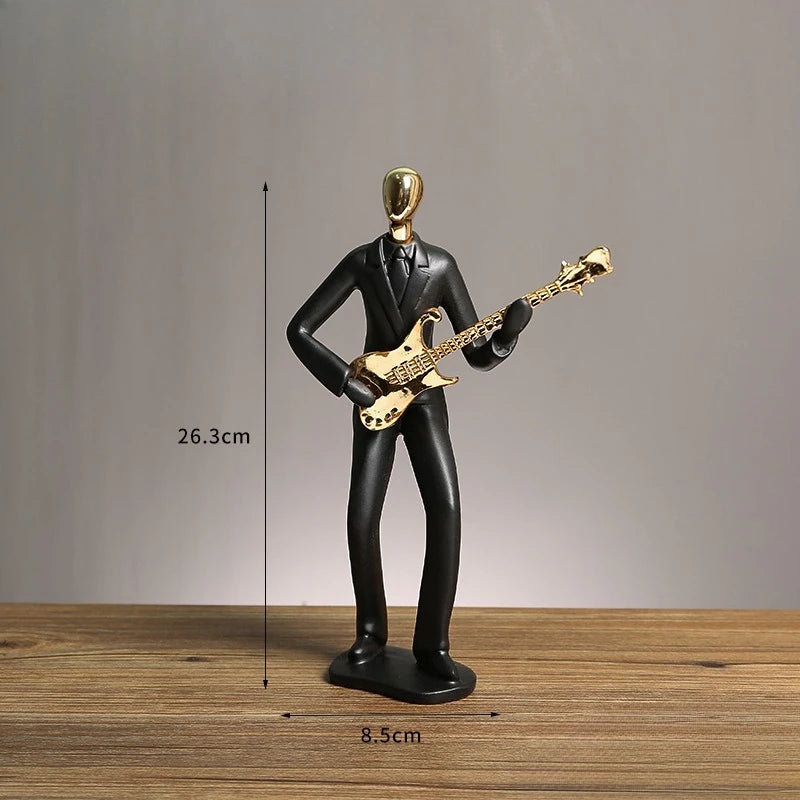 Statue of a person playing a guitar with dimensions indicated on a wooden surface and gray background