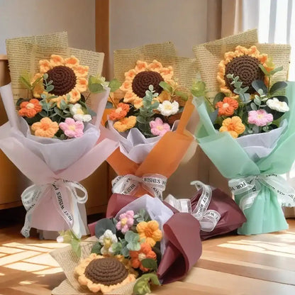 Sunflower-themed bouquets with ribbons on a wooden surface