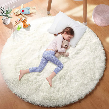 Child lying on a fluffy white rug with toys around