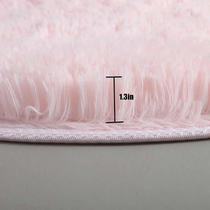 Close-up of pink fluffy material with a measurement label indicating 1.3 inches.