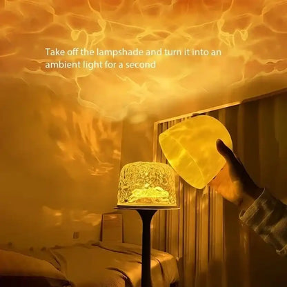 Person removing a lampshade to reveal a warm glow in a room.
