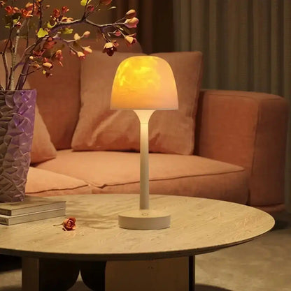 Table lamp on a round marble table with a cozy living room setting