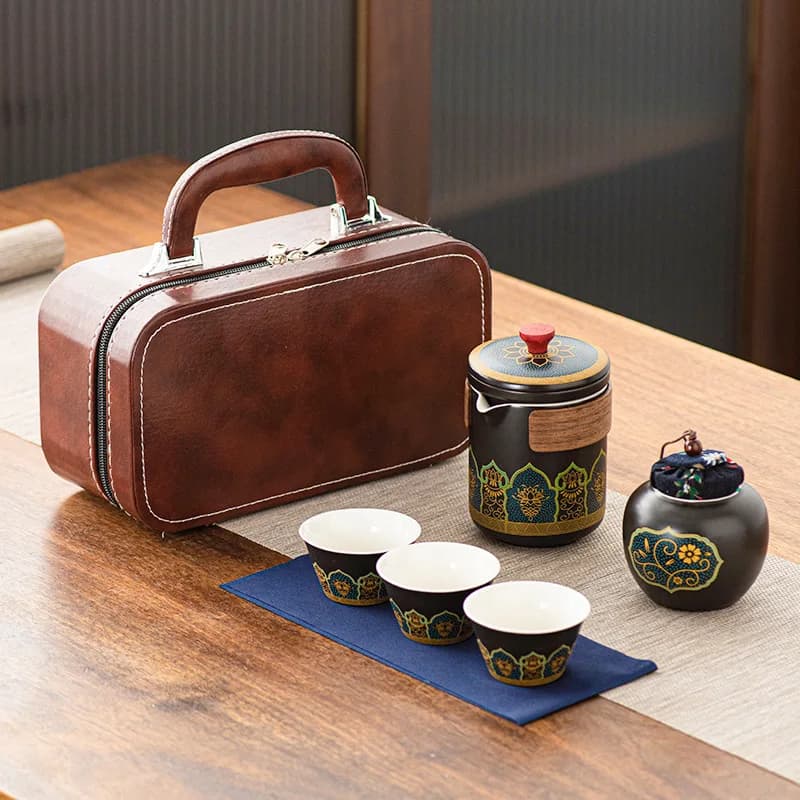 Tea set with ceramic containers and cups on a wooden table