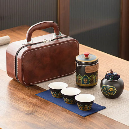 Tea set with ceramic containers and cups on a wooden table