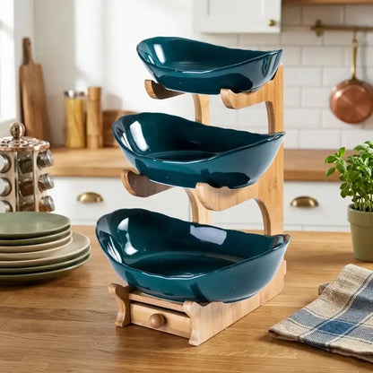 Three-tiered wooden bowl stand with teal bowls in a kitchen setting
