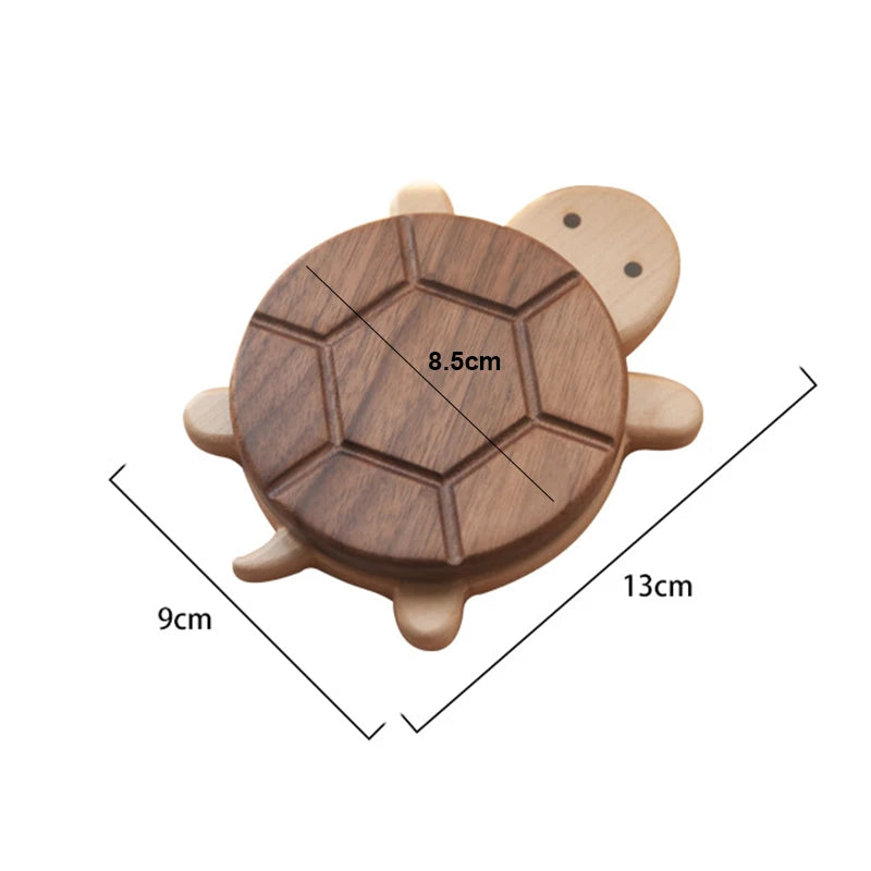 Wooden turtle-shaped coaster with dimensions on a white background