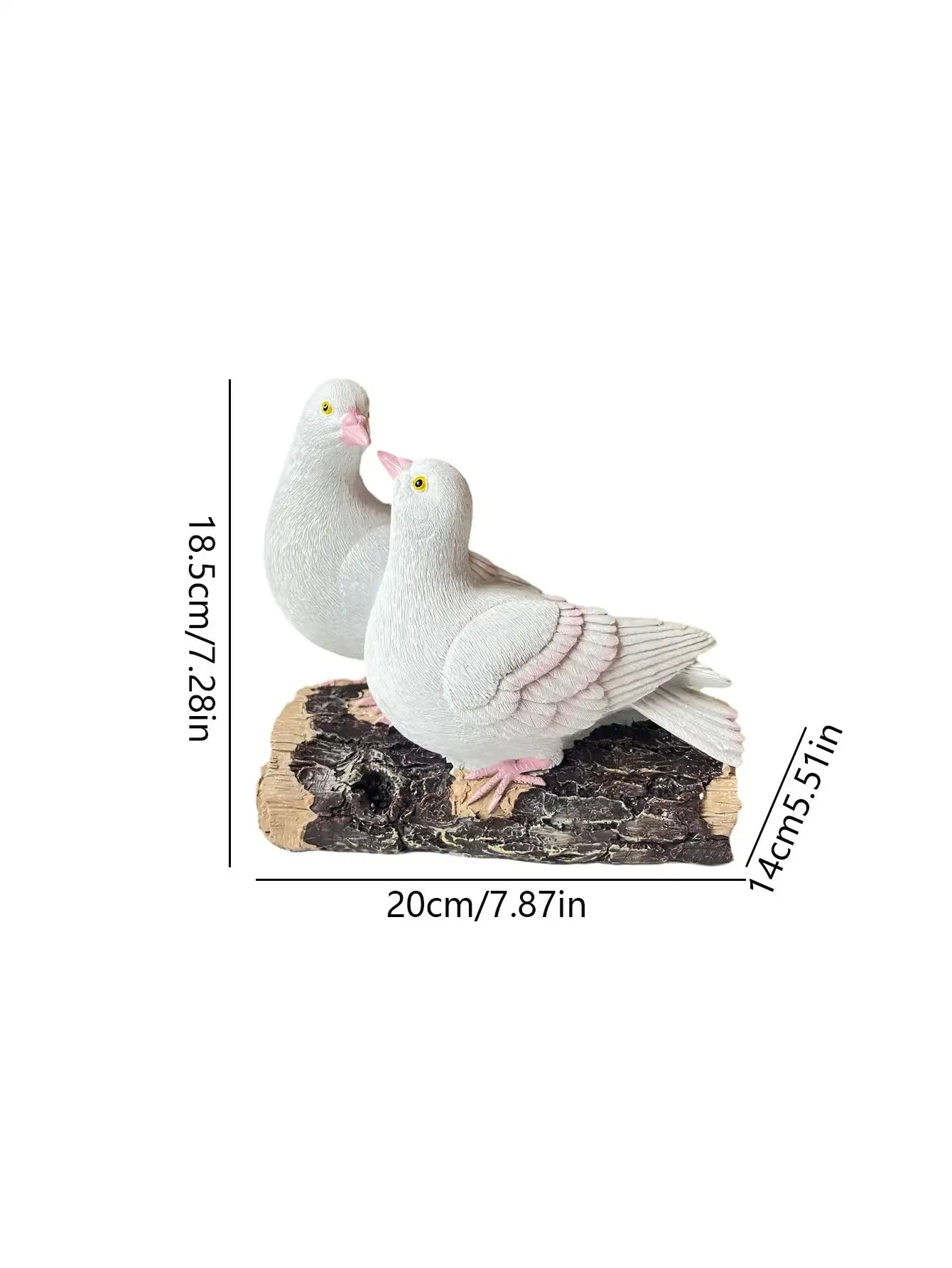 Two white pigeon figurines on a branch with measurements indicated.