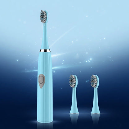 Light blue electric toothbrush with two additional brush heads on a blue gradient background