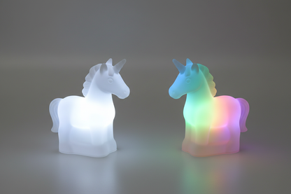 Unicorn magic light in white and multicolor variants shown side by side glowing on white background