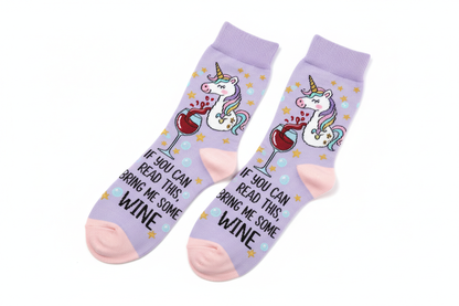 Flat lay of unicorn wine socks on white background showing full unicorn and wine glass print design and 31cm length
