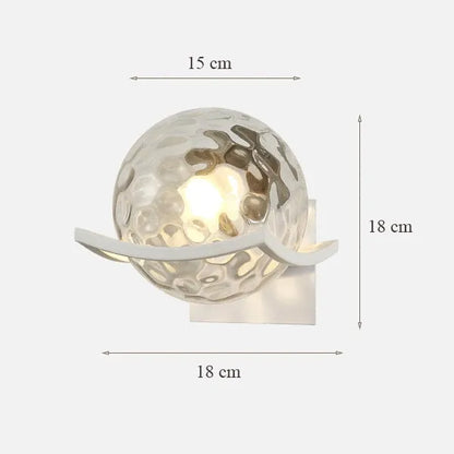 Wall-mounted light fixture with dimensions on a white background