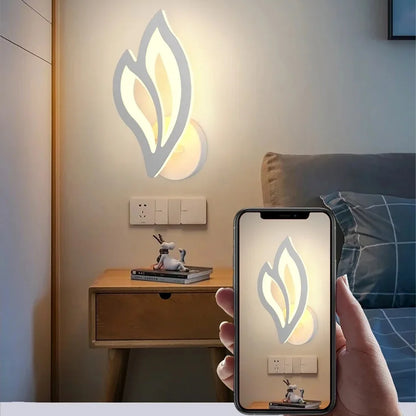Wall-mounted light fixture with smartphone displaying a similar design, in a room setting.