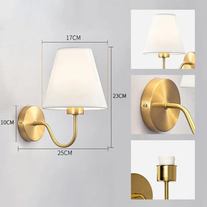 Wall lamp with gold finish and white shade, showing dimensions on a gray background.