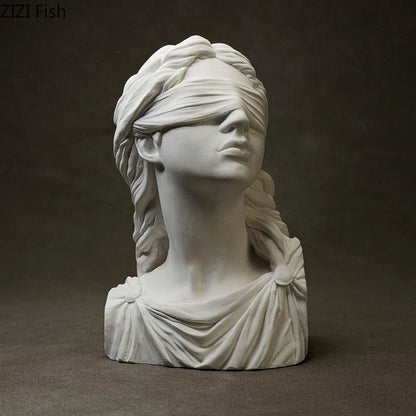 White marble bust of a woman with a blindfold on a dark background