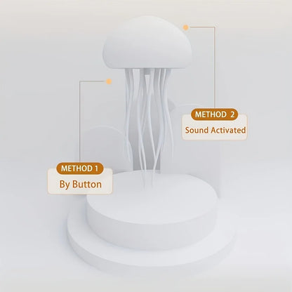 White jellyfish-shaped lamp with two activation methods labeled on a light gray background