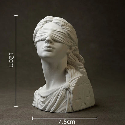 White marble bust of a woman with a blindfold, shown with measurements on a dark background