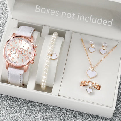 Rose gold watch, pearl bracelet, necklace, and earrings in a box with 'Boxes not included' text.