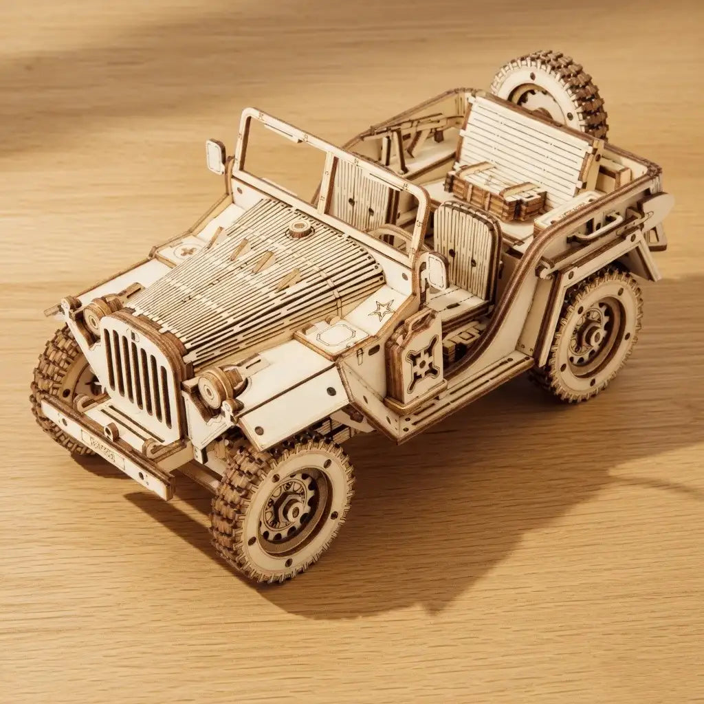 Wooden model of a Jeep on a wooden surface
