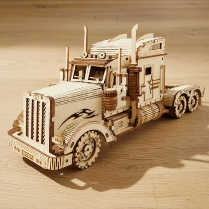 Wooden model of a truck on a wooden surface