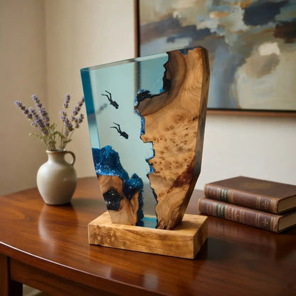 Decorative piece with wooden base and glass insert on a table
