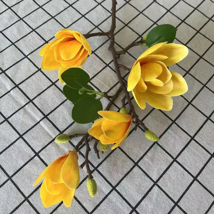 Yellow artificial flowers on a grid background