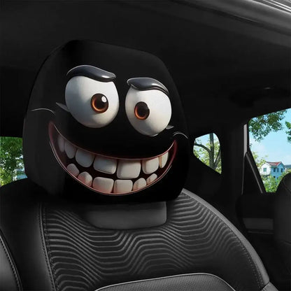 A car headrest cover with a cartoon face design in a car interior