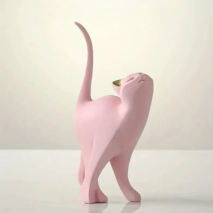 Pink cat-shaped sculpture on a white background