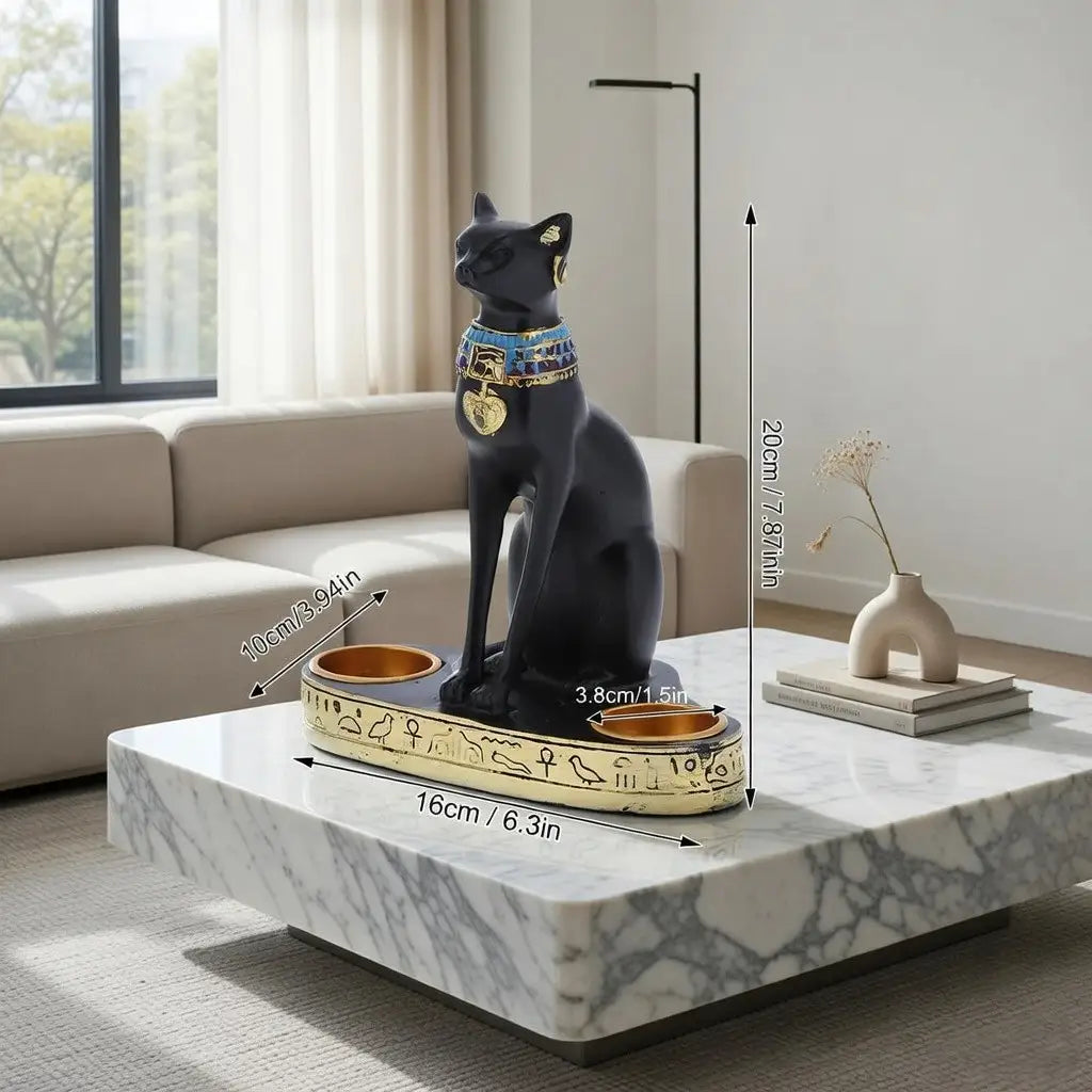 Decorative cat statue with measurements on a marble coffee table in a living room.