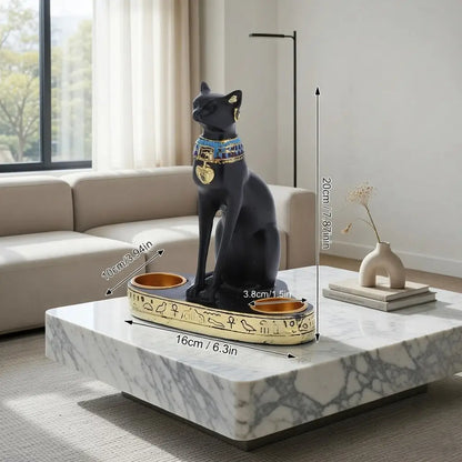 Decorative cat statue with measurements on a marble coffee table in a living room.