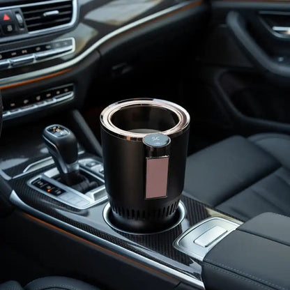 Car cup holder with a black car charger inside a vehicle.