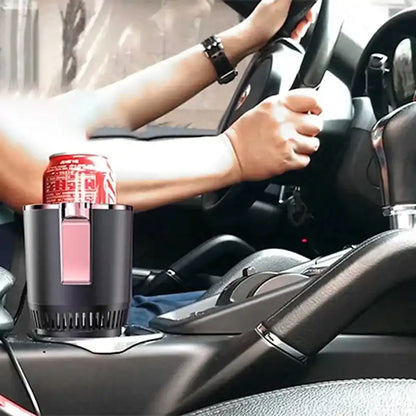 Car cup holder with a can of pop, placed on a car dashboard.