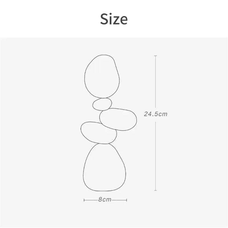 Measurement chart showing the dimensions of a decorative item with stones stacked on top.