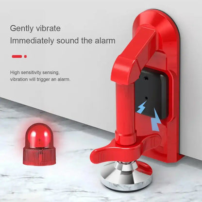 Red door alarm system with vibration sensor on a white background