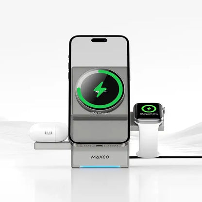 Maxco charging station with smartphone, smartwatch, and headphones on a white background